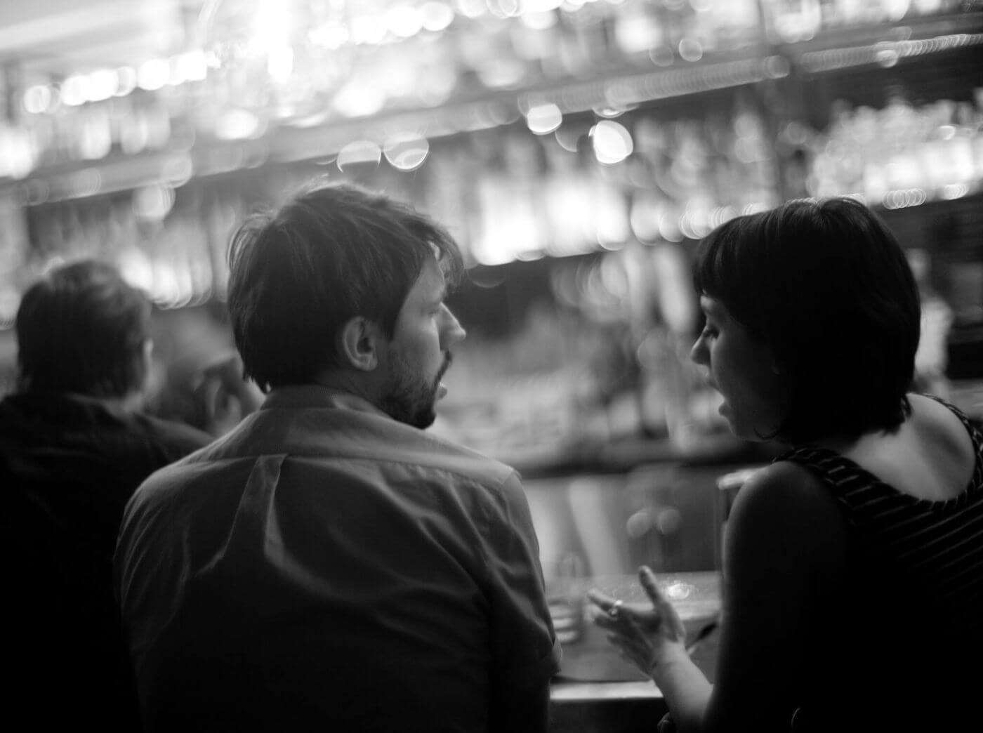 Person hesitating to express feelings, highlighting signs of fearing vulnerability in relationships