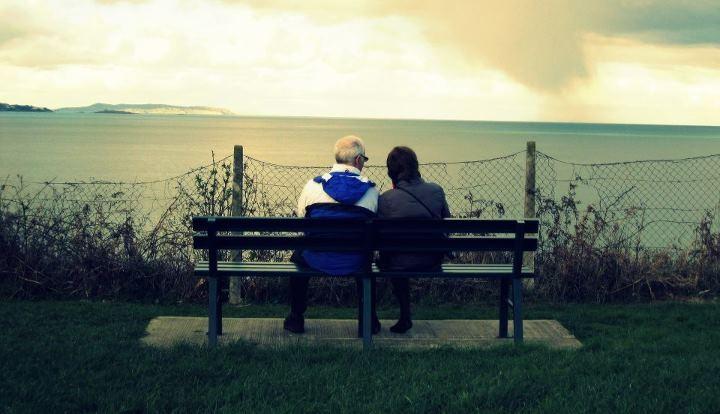 Person reflecting on uncertainty in a relationship connected to partner pull away when things are going well