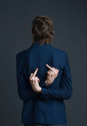 Individual contemplating feelings of inadequacy while comparing their relationship to others