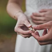 A couple sitting in a cafe looking worried after discussing future plans