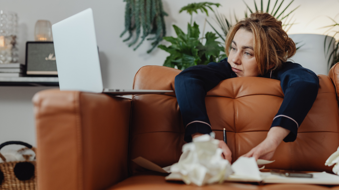 Individual feeling overwhelmed by societal and relational expectations in a stressful environment