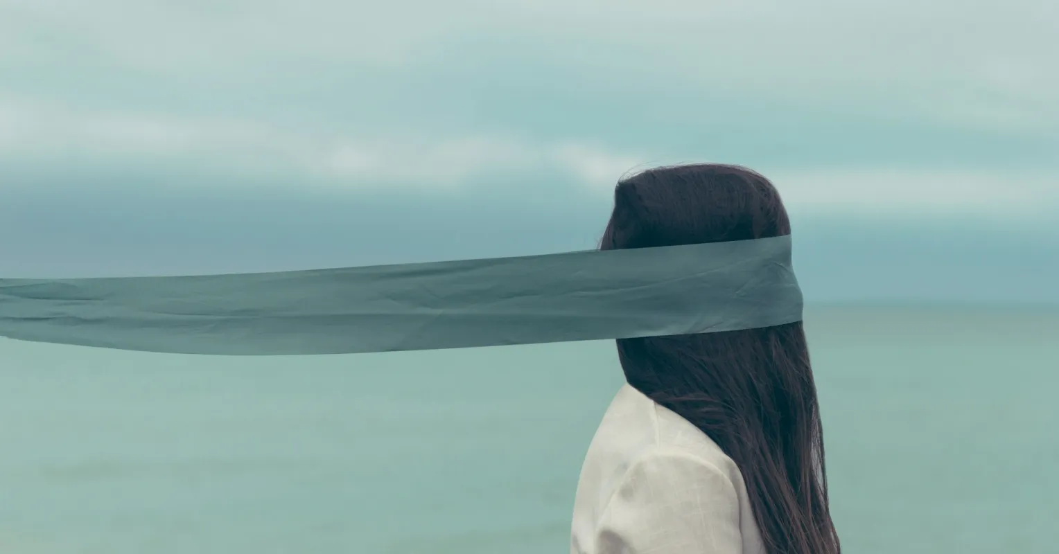 A woman looks conflicted while considering subtle signs of covert manipulation in relationships.