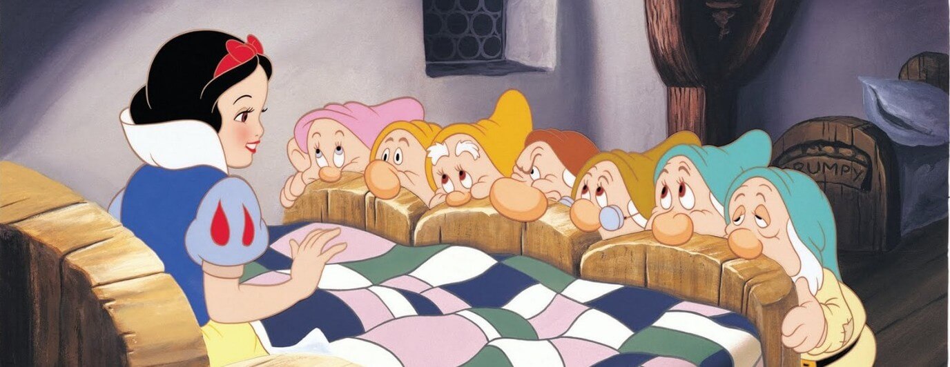 A person watching a romantic movie, contemplating feelings of unworthiness from media portrayals