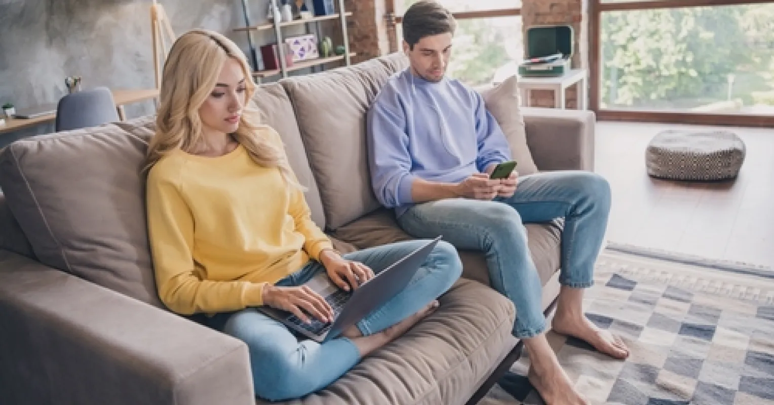 Person using AI tools, contemplating emotional detachment from real relationships