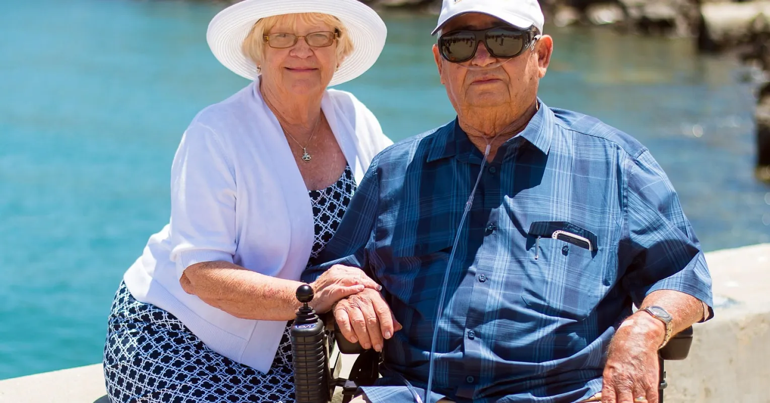 Person experiencing mixed emotions while caring for elderly parents and feeling jealous of siblings