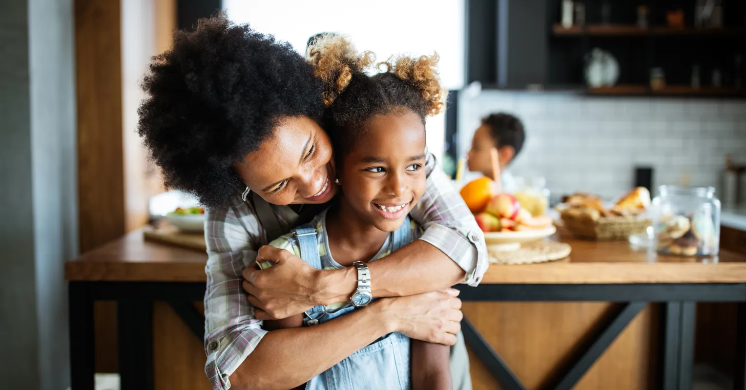 Parent sharing an emotionally open moment with a child, illustrating emotional patterns