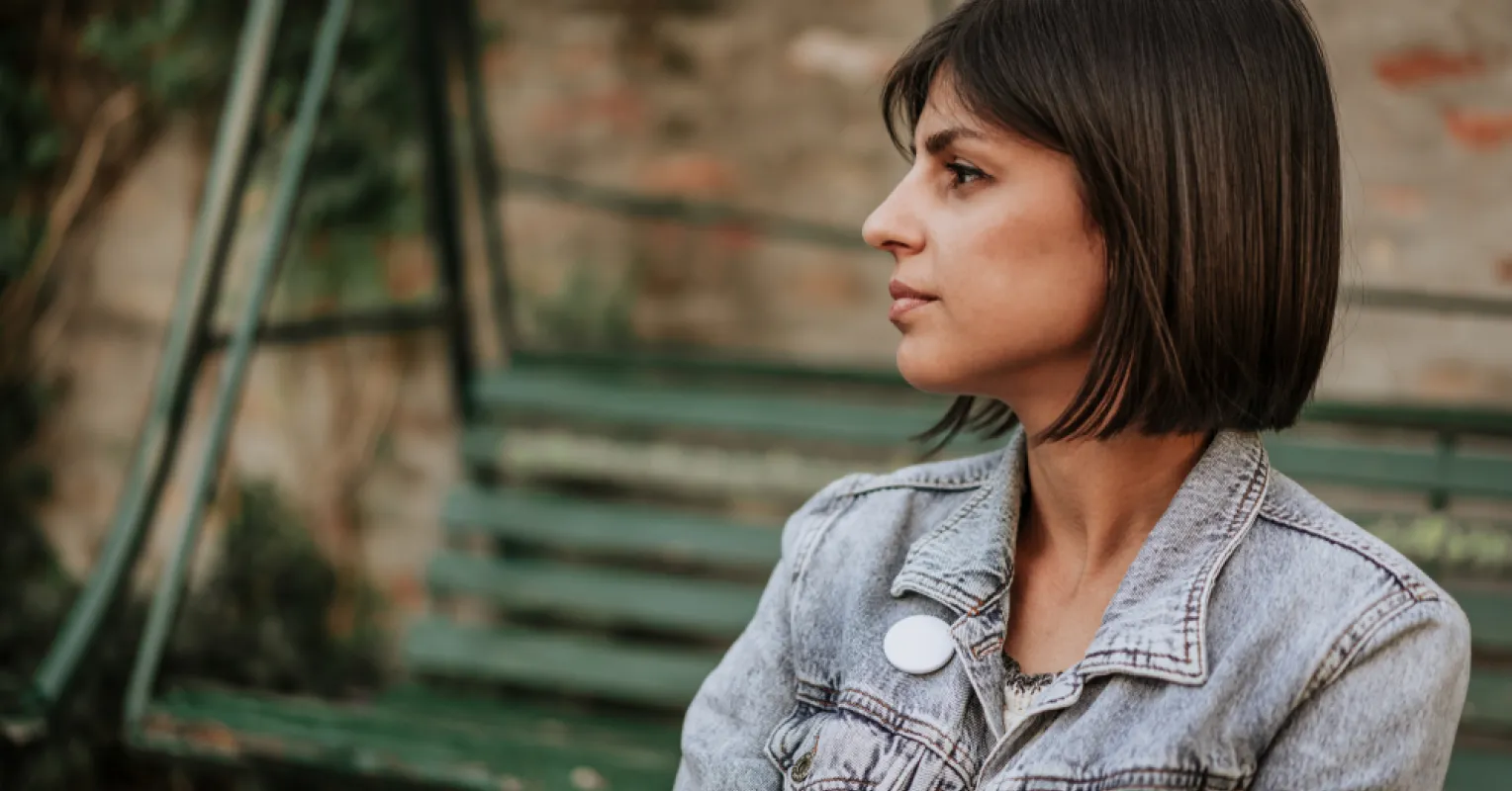 Person contemplating self-esteem issues stemming from family rejection and estrangement