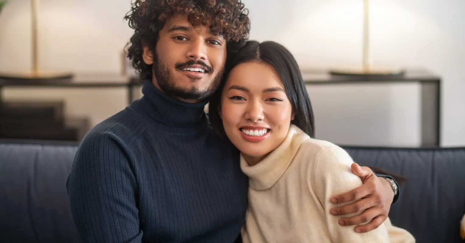 Couple discussing emotional needs and connection in a cozy setting