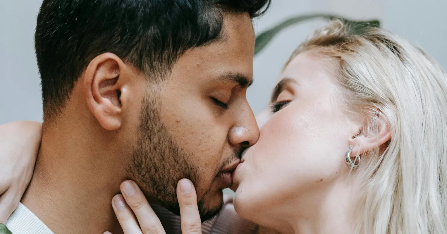 Couple sitting apart, reflecting on feelings of emotional disconnection in their relationship