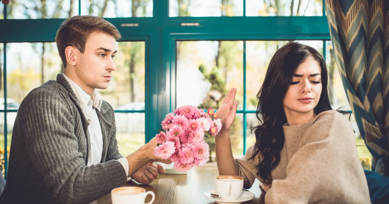 Individual reflecting on feelings of inadequacy after experiencing relationship rejection