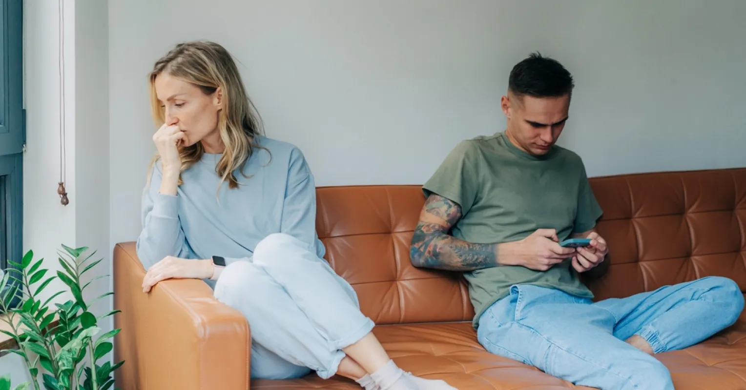 Individual contemplating the meaning behind mixed signals in a romantic relationship