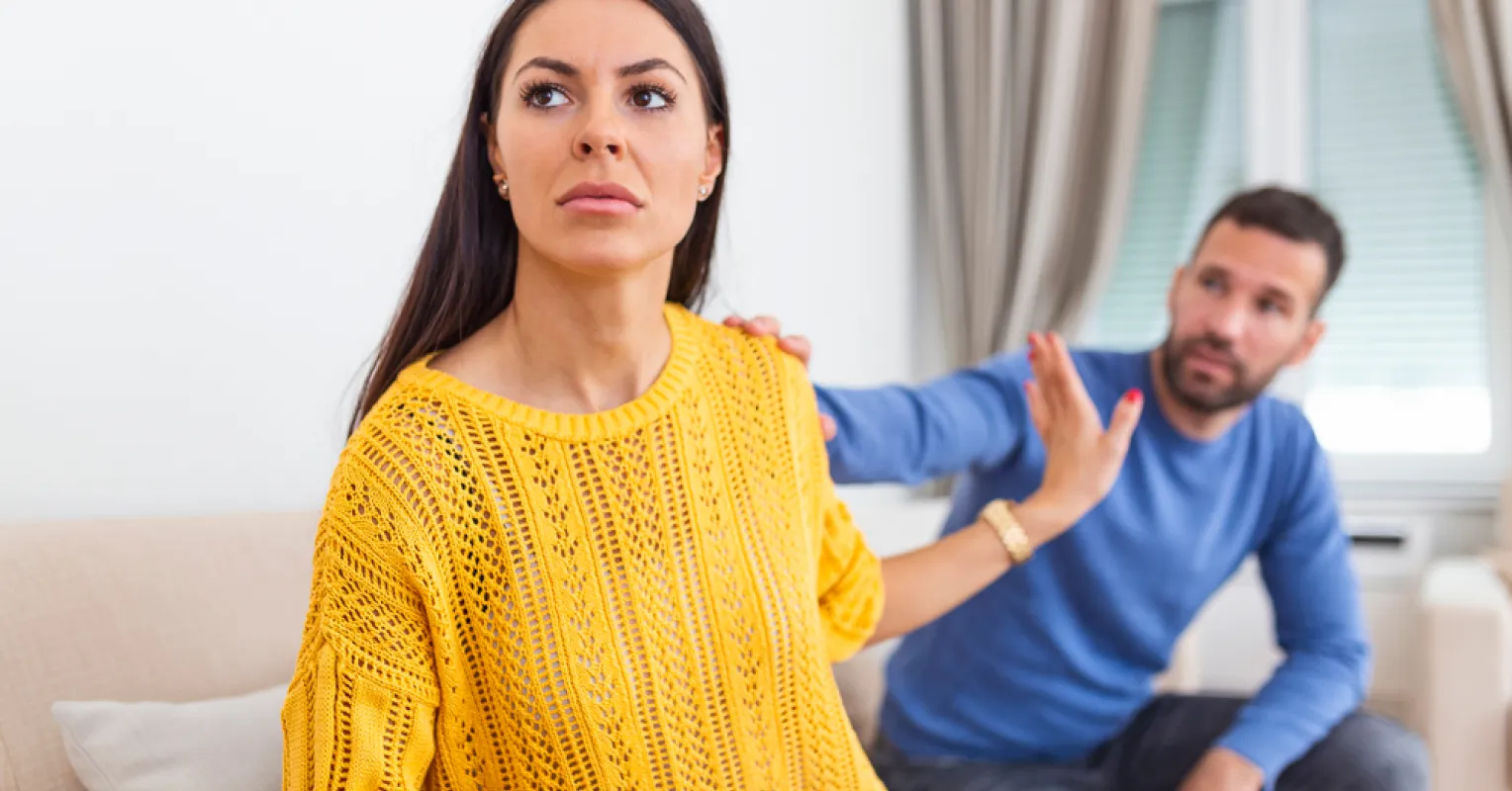 A person contemplating their feelings of shame after receiving criticism from a partner