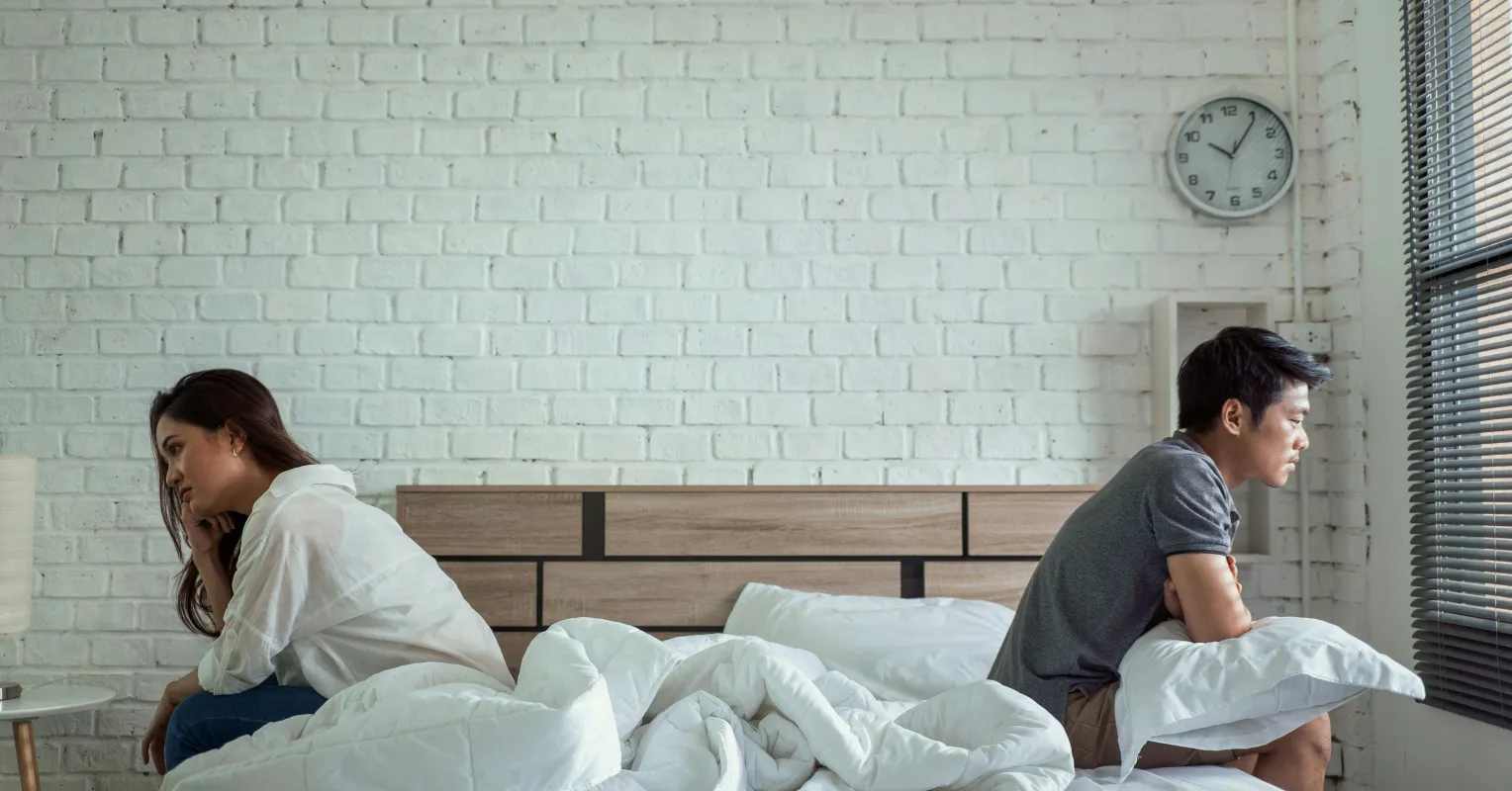 Couple discussing feelings during a tense argument to reduce overwhelm
