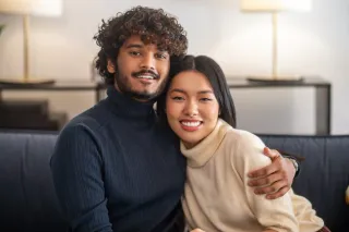 Couple sharing a quiet moment while discussing their need for connection in a relaxed setting