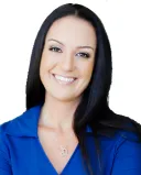 Individual seeking reassurance from a partner during an emotionally charged conversation