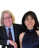 Couple in a conversation feeling disconnected despite positive relationship signals.