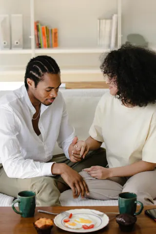 Woman expressing concern about small issues during a happy moment in a relationship