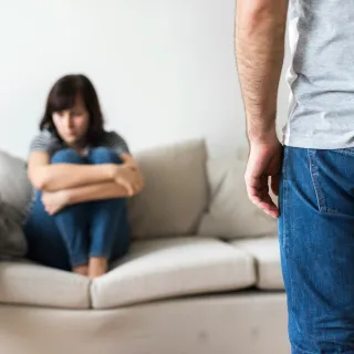 Couple discussing feelings to understand relationship signals for emotional updates