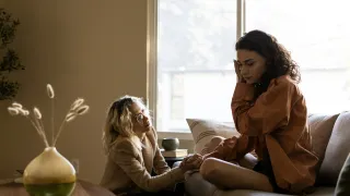 Individual contemplating their reactions to unsolicited advice in a tense conversation