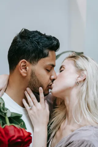 Couple sitting apart, reflecting on emotional disconnection in their relationship