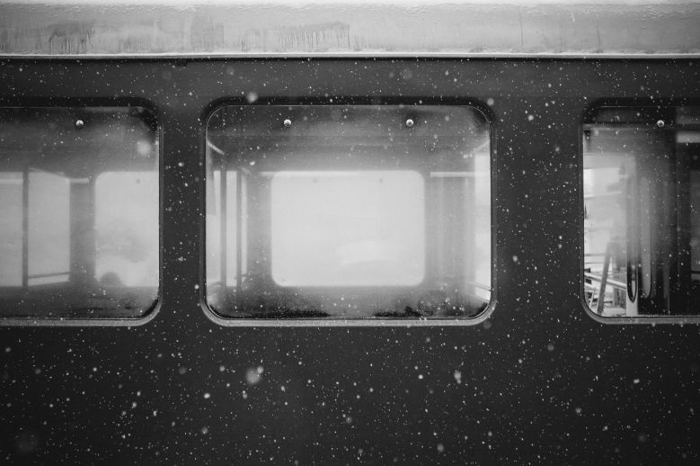 Traveler reflecting on feelings of emptiness after an exhilarating journey