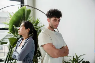 Person reflecting on uncertainty in a relationship connected to my partner avoids discussing our intimate connection