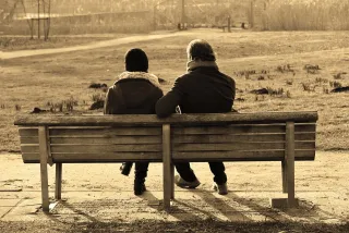 Individual contemplating emotional distance after shifting nurturing behavior in their relationship