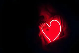 Individual contemplating feelings of rejection in new relationships after a recent breakup