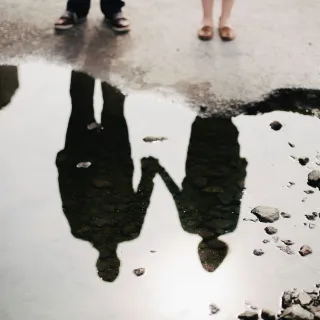 Individual pondering their dating preferences and emotional connections in relationships