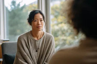 Person reflecting on emotional behavior and meaning connected to why is it so hard to tell someone what