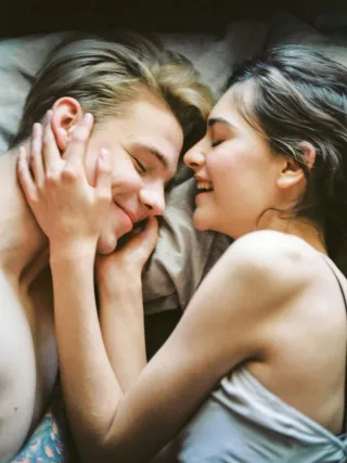 Couple communicating emotional distance after phone distraction post intimacy