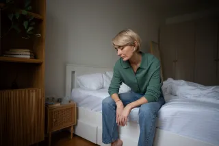 Person deep in thought, contemplating past feelings and present relationship signals