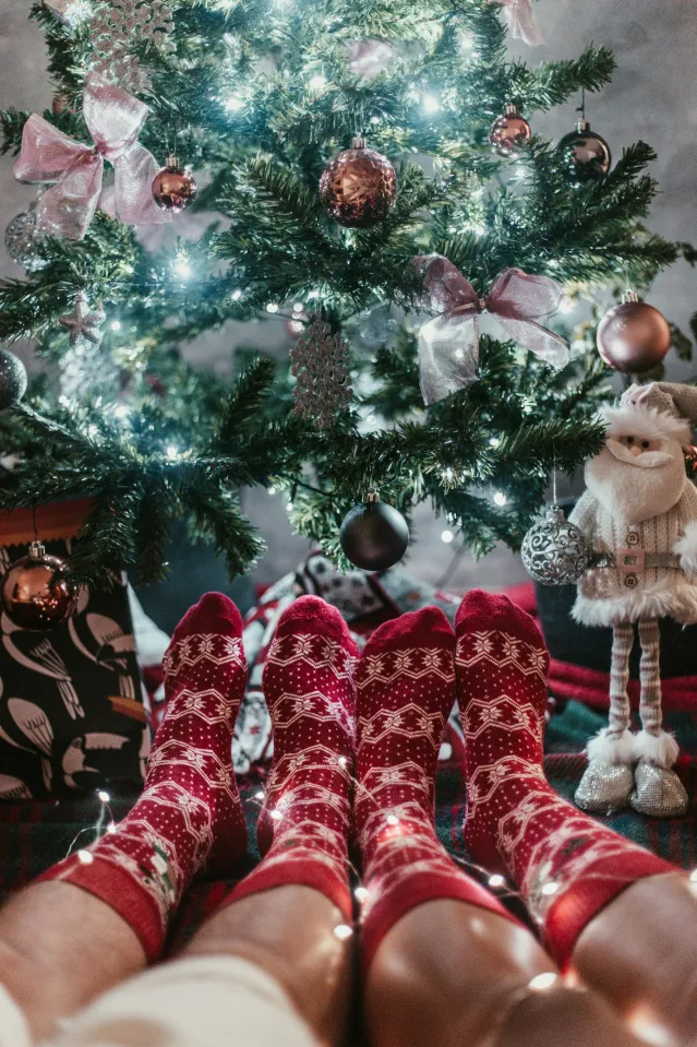 Couple looking away from each other, highlighting emotional distance during the holidays