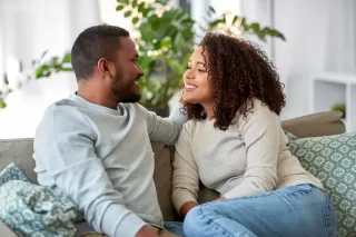 Individual hesitating to express feelings in a relationship, reflecting uncertainty and unease