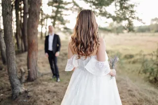 Couple sharing a confused glance, reflecting on mixed signals in their relationship