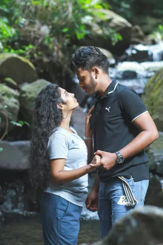 Individual contemplating sharing feelings with their partner, reflecting on relationship signals