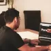 Couple sitting apart, highlighting signs of emotional distance influenced by pornography