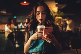 Individual feeling neglected while partner engrossed in their phone, signaling disconnection in relationships
