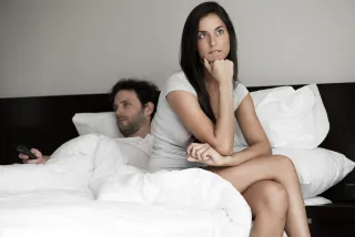 Person reflecting on uncertainty in a relationship connected to i stay in a relationship that doesnt make me