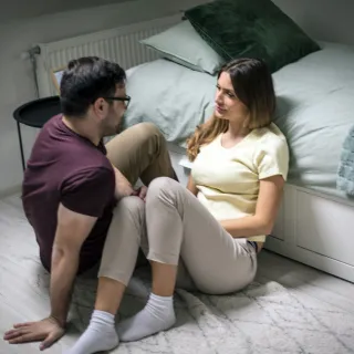 Individual contemplating their attachment style while feeling a need for personal space in a relationship