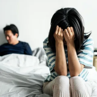 Individual pondering over unmet needs in a difficult relationship