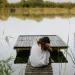 Person experiencing conflicting emotions while contemplating love and hate for their partner