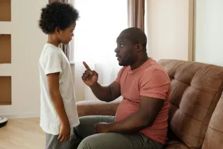 Child with a worried expression, contemplating the meaning behind lying about trivial matters