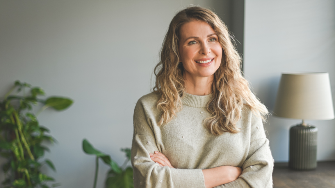 Individual listening attentively, showcasing engagement despite being quiet in the conversation
