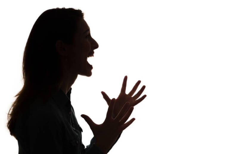 Partner appearing withdrawn, hinting at signs of feeling overwhelmed in the relationship