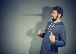 Couple looking conflicted, illustrating attachment to an affair partner amidst emotional turmoil