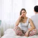 Couple discussing work-related stress and its impact on their relationship dynamics.