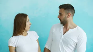 A couple discussing relationship signals while evaluating the 90-day dating rule