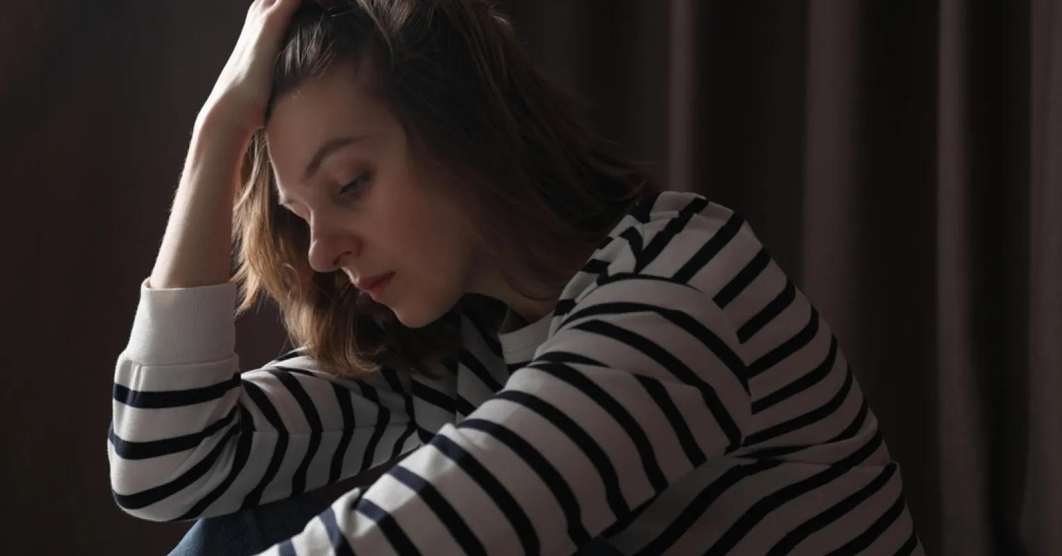 Family gathering where one member feels isolated, hinting at black sheep dynamics
