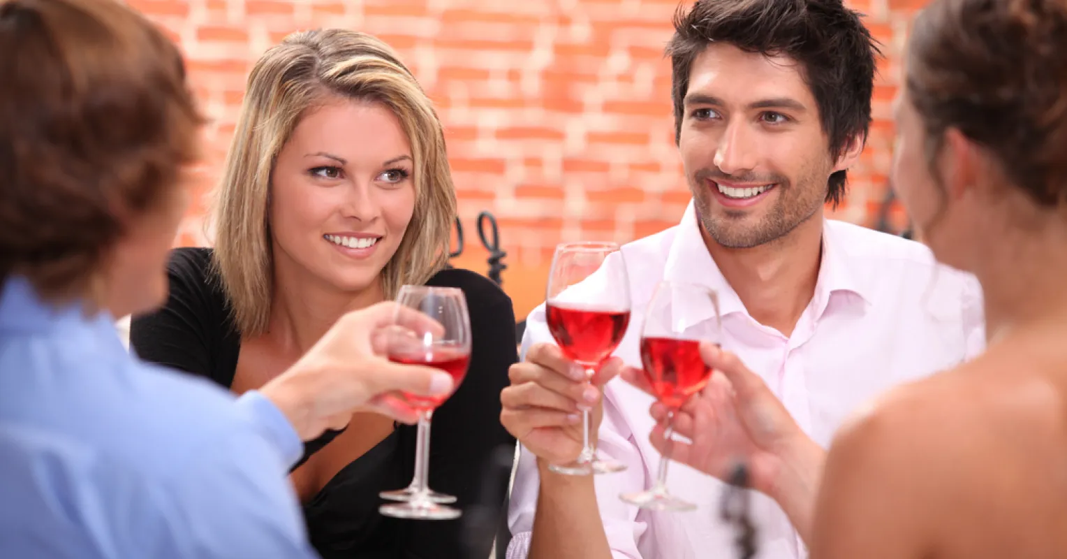 Group of friends examining emotional triggers related to jealousy in polyamorous dynamics